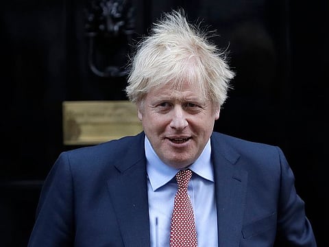 Britain's Prime Minister Boris Johnson leaves 10 Downing Street to attend the weekly session of Prime Ministers Questions in Parliament in London, Wednesday, Jan. 29, 2020.