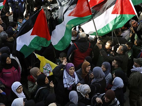 Palestinians chant slogans during a protest against the White House plan for ending the Israeli-Palestinian conflict, at Burj Al Barajneh refugee camp, south of Beirut, Lebanon, on January 31, 2020.