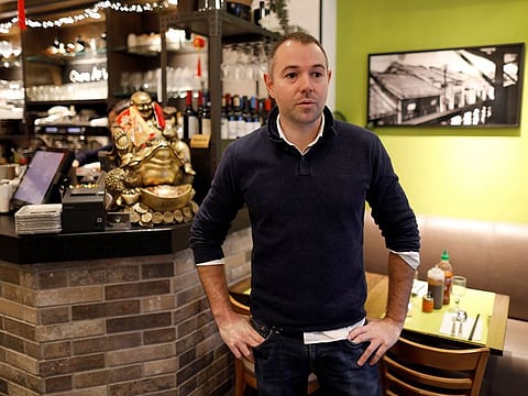 Restaurant owner Pascal Corlier poses inside his restaurant Comme au Vietnam in Paris, France, January 31, 2020.