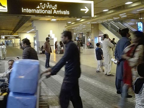 Passengers at the Jinnah International Airport in Karachi.