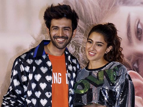 Maharshtra, Jan 18 (ANI): Bollywood Actors Kartik Aaryan along with actress Sara Ali Khan poses during trailer launch of their upcoming film "Love Aaj Kal 2" in Mumbai on Friday. (ANI photo)