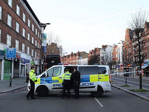 Police continue to secure the scene following a terror stabbing attack in the Streatham area of south London Monday Feb. 3, 2020.