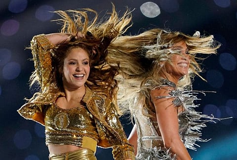 Jennifer Lopez and Shakira perform during the halftime show.