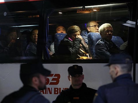 Passengers of an Air Canada Boeing 767 aircraft which made an emergency landing, sit on the bus leaving the terminal at Madrid's Barajas Airport, in Madrid, Spain February 3, 2020.