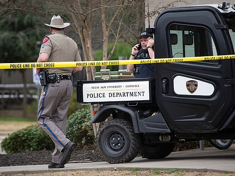 Law enforcement officers work the scene a shooting outside of the Pride Rock residence at Texas A&M University-Commerce in Commerce, Texas, Monday, Feb. 3, 2020.