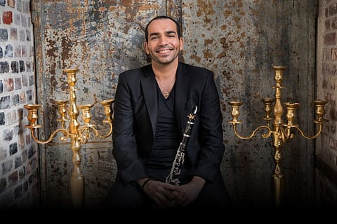 Pierre Genisson plays the clarinet.