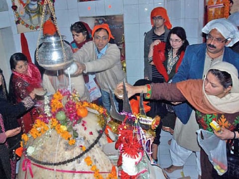 Hindu devotees performing rituals during the Maha Shivaratri festival at the Shiv Temple in Mansehra city of Khyber Pakhtunkhwa in Pakistan.