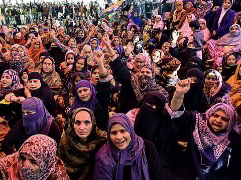 Muslim women shout slogans against India's new citizenship law, during a protest at Shaheen Bagh area  near the Jamia Millia Islamia university in New Delhi.