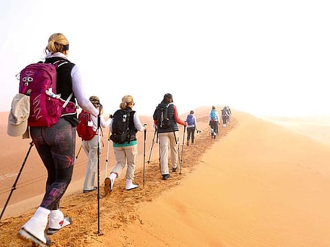 Some 60 women from 24 nationalities walk for five days through the desert from Abu Dhabi to Al Ain.