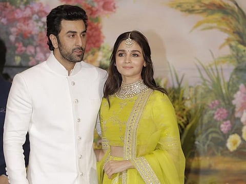 Mumbai: Actors Ranbir Kapoor and Alia Bhatt at the wedding reception of actress Sonam Kapoor and businessman Anand Ahuja in Mumbai on May 8, 2018. (Photo: IANS)
