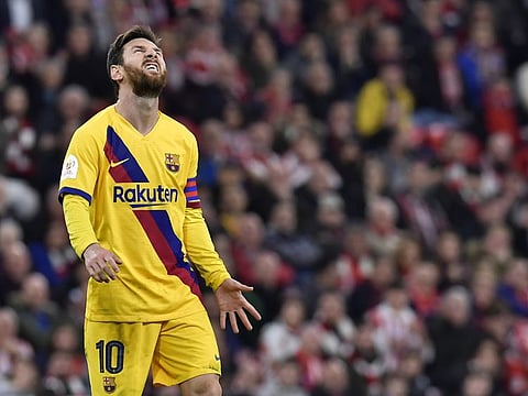 Barca star Lionel Messi reacts after a missed scoring opportunity during their Spanish Copa del Rey quarter-final match against Athletic Bilbao at San Mames stadium in Bilbao, late on February 6, 2020.
