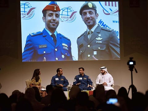Hazzaa Al Mansoori and Sultan Al Neyadi with Saeed Karmostaji