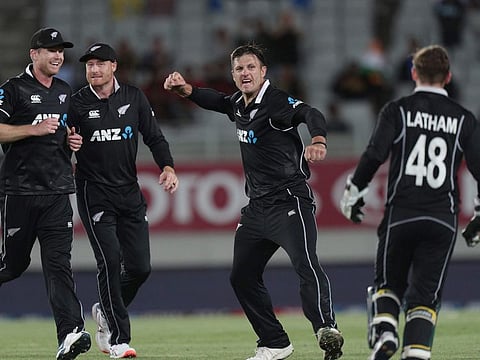 New Zealand’s Hamish Bennett (Centre) celebrates the wicket of India’s Shreyas Iyer during the second one-day international cricket match between New Zealand and India at Eden Park in Auckland on February 8, 2020.