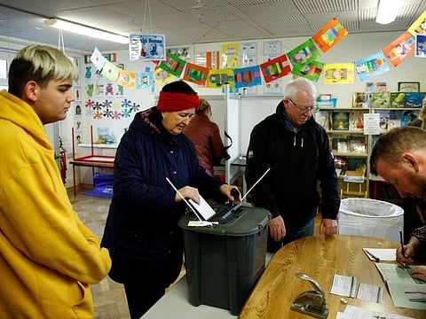 People vote in Ireland's national election in Cork, Ireland, on February 8, 2020.