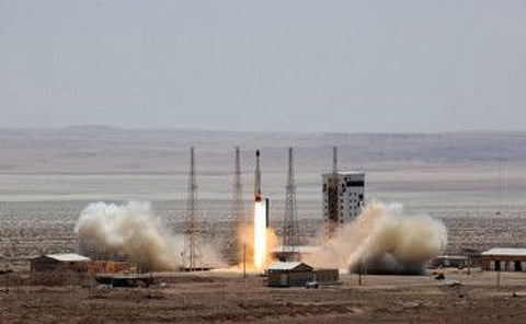 This file handout picture released by Iran's Defence Ministry on July 27, 2017 shows a Simorgh (Phoenix) satellite rocket at its launch site at an undisclosed location in Iran. Iran started counting down on Sunday to the launch of a new "scientific observation" satellite scheduled within hours, the country's telecommunications minister said.