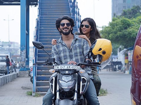 Dulquer Salmaan and Kalyani Priyadarshan in 'Varane Avashyamund'.