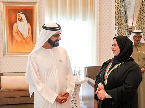 His Highness Shaikh Mohammed Bin Rashid Al Maktoum honouring  'Mama Shaikha' with the PM's Medal