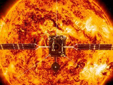 This illustration made available by NASA depicts the Solar Orbiter satellite in front of the Sun.