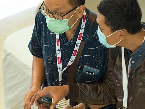 Visitor wearing mask at Arab Health at Dubai World Trade Centre. Photo: Virendra Saklani/Gulf News