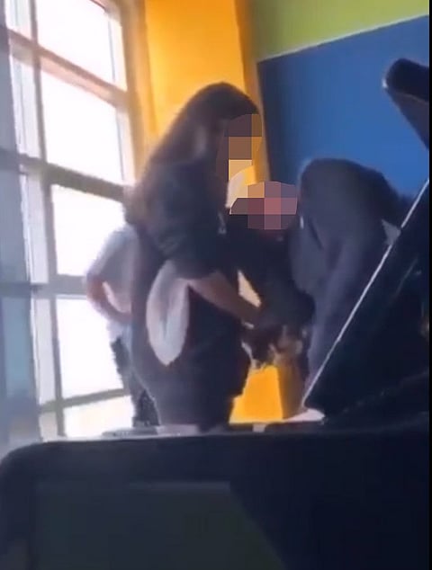 The footage was posted by a Twitter user who asked Dubai Police and the KHDA for further action