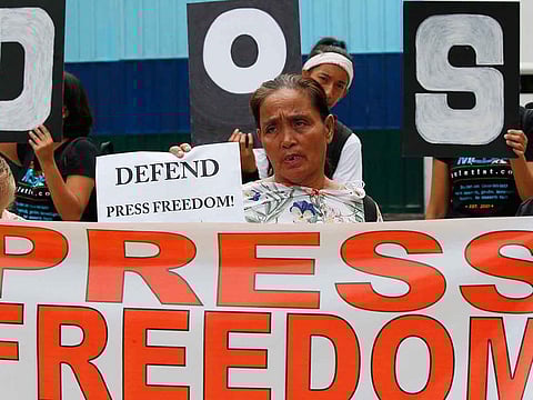 Protesters rally outside the armed forces headquarters to mark World Press Freedom Day which was declared by the UN General Assembly in Manila, Philippines, in this file photo.