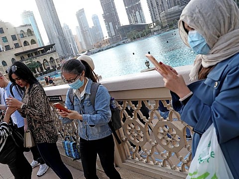Many visitors to malls in Dubai wear masks. Photo Clint Egbert/Gulf News
