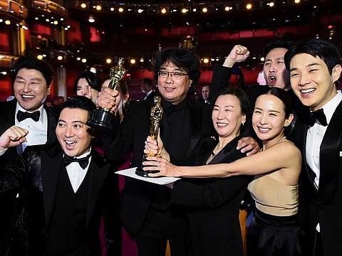 Bong Joon Ho and the cast of 'Parasite' pose at the 92nd Academy Awards in Hollywood, Los Angeles.