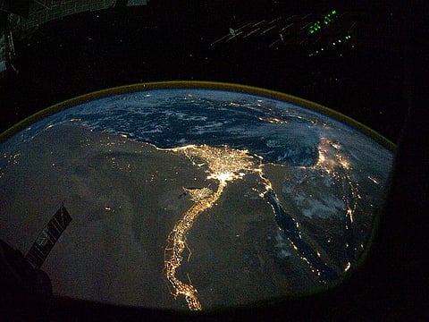 A NASA satellite image, taken by one of the Expedition 25 crew members on the International Space Station, shows the lights of Cairo, Alexandria and the Nile River, Egypt October 28, 2010.