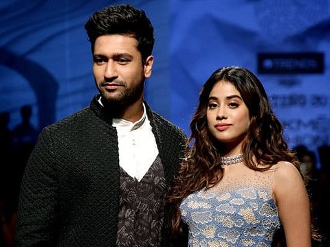 Maharashtra, Feb 12 (ANI): Indian Bollywood actors Vickey Kaushal and Janhvi Kapoor showcase the creation of multiple designers to celebrate 20 Years of Lakme Fashion Week during the inaugural show of the Lakme Fashion Week (LFW) Summer Resort 2020, in Mumbai on Tuesday. (ANI Photo)
