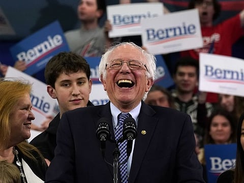 Democratic presidential hopeful Vermont Senator Bernie Sanders speaks at a Primary Night event at the SNHU Field House in Manchester, New Hampshire on February 11.