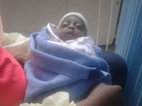 Bright Chinyeaka Okpara (29) is desperately seeking help to pay his son's hospital bill which amounts to around Dh415,450