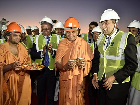 Brahma Vihari Swami, Senior Saint, BAPS Hindu Temple, along with Pavan Kapoor Indian Ambassador in UAE, inaugurates the concrete pouring ceremony on 13th February, 2020.
