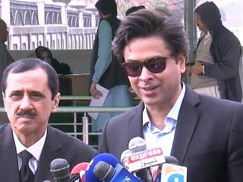 Popular Pakistani Shehzad Roy with his lawyer speaking to media outside the court after verdict banning corporal punishment for children. Photo/ courtesy Dawn news