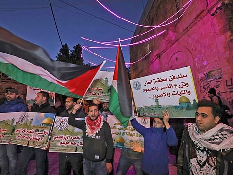 Palestinian protest against the US-proposed peace plan following Friday morning prayers at the Ibrahimi Mosque in West Bank on February 14, 2020