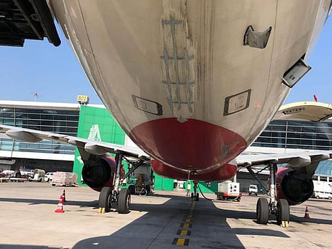 Upon landing at Delhi, damage was observed on the fuselage skin and frame of the Air India aircraft and it was withdrawn from service for investigation.