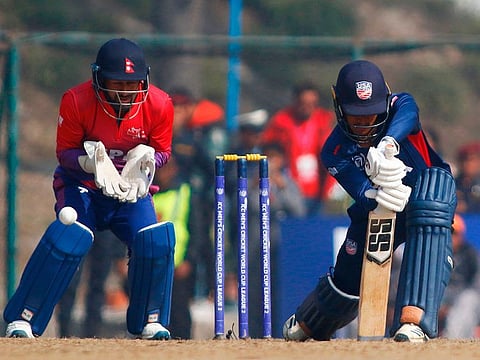 US cricketer Akshay Homraj plays a shot during the ODI against Nepal