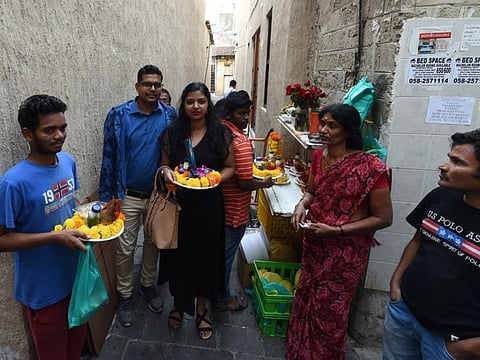 Residents head to the Bur Dubai temple after it reopened at 6pm on Tuesday