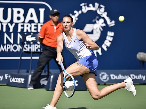 Carolina Pliskova returns against Kristina Mladenovic on third day at the Dubai Duty Free Tennis Championship on Wednesday.