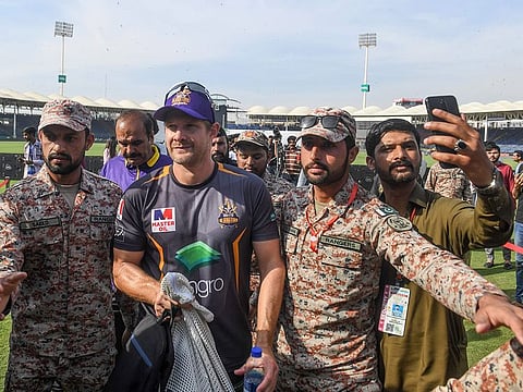 Rangers escort Quetta Gladiators' Shane Watson in Karachi
