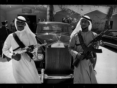 Security guard the famed Rolls Royce Phantom in 1968 in Abu Dhabi