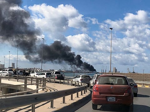 A smoke rises from a port of Tripoli after being attacked in Tripoli, Libya February 18, 2020.