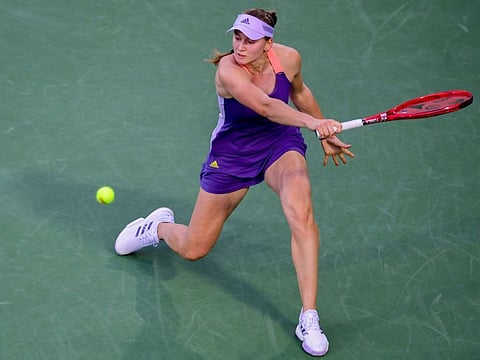 Kazakhstan's Elena Rybakina returns the ball to Croatia's Petra Martic during their Dubai Tennis Championships semi-final match in the Gulf emirate on February 21, 2020.