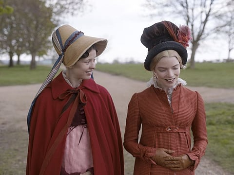 Actors Mia Goth, left, as Harriet Smith and Anya Taylor-Joy as Emma Woodhouse in 'Emma'.