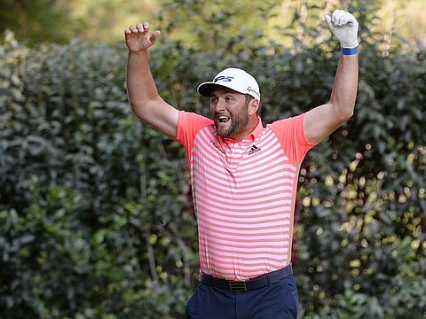 Jon Rahm celebrates after a hole-in-one on the 17th hole during the third round of the WGC - Mexico Championship golf tournament at Club de Golf Chapultepec.