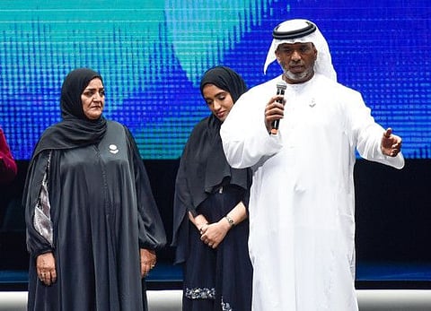 Ahmad Al Falasi on stage with his family at the 2020 Arab Hope Maker Awards ceremony