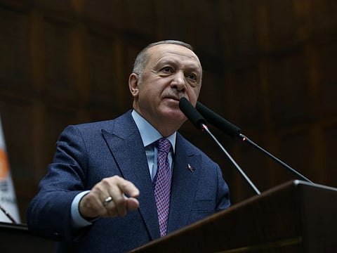 Turkish President Tayyip Erdogan addresses members of his ruling AK Party at the Parliament in Ankara on February 19, 2020.