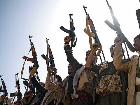 Houthi rebel fighters chant slogans as they hold their weapons during a gathering aimed at mobilizing more fighters for the Iranian-backed Houthi movement, in Sanaa, Yemen, Thursday, Feb. 20, 2020. The Houthi rebels control the capital, Sanaa, and much of the country’s north, where most of the population lives. They are at war with a U.S.-backed, Saudi-led coalition fighting on behalf of the internationally recognized government.