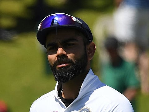 India's captain Virat Kohli walks off the field following his team's ten wicket loss.