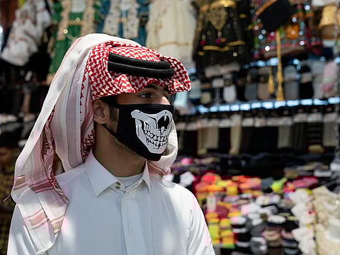 A man wears protective face mask, following the outbreak of the new coronavirus, in Kuwait