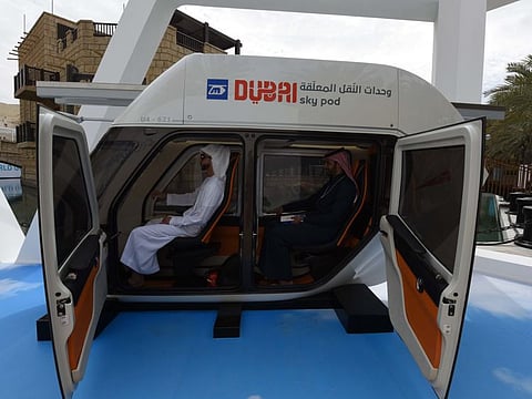 Delegates looking at the Dubai Sky Pod Vehicle which will help shape the future of transportation in Dubai during the World Government Summit at Madinat Jumeirah on February 10 2019